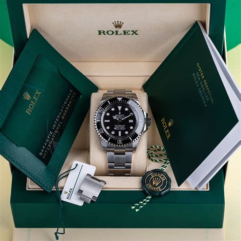 rolex watch box and papers